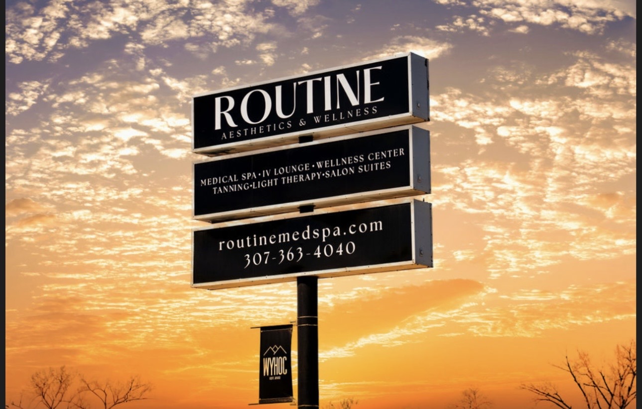 Business Sign at Sunset